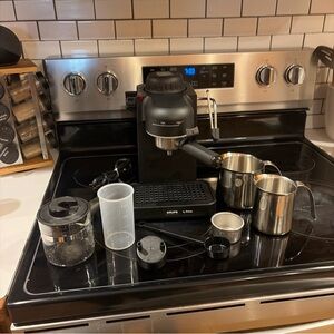 Krups Black Espresso Maker with Stainless Milk Pitchers and Accessories